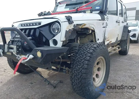 2014 Jeep Wrangler Unlimited Sport z USA, uszkodzony, nr VIN 1C4BJWDG7EL210262